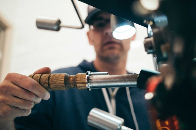 A plumber thinking about the risks of putting off plumbing repairs.