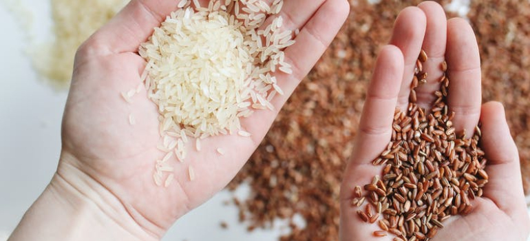 a person holding rice