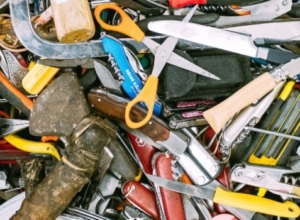 Various tools a homeowner should have, scattered around.