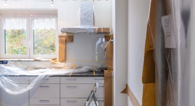 A kitchen during a renovation that involves plumbing upgrades